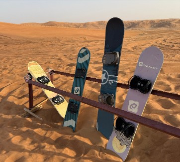 dubai desert sandboarding.