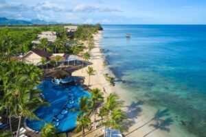 Mauritius holiday with Armani Tours and Travel — crystal turquoise lagoon with tropical coral reef and luxury resort