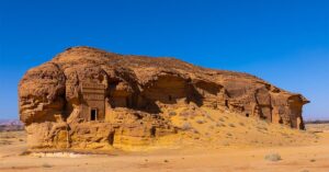 Saudi Arabia tour Al-Ula Hegra — ancient Nabataean rock-cut tombs in rose-red sandstone, Armani Tours Saudi Arabia cultural safari