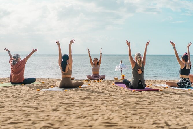 Daily sunrise yoga on Zanzibar's pristine beaches — the energizing heart of this Zanzibar yoga retreat