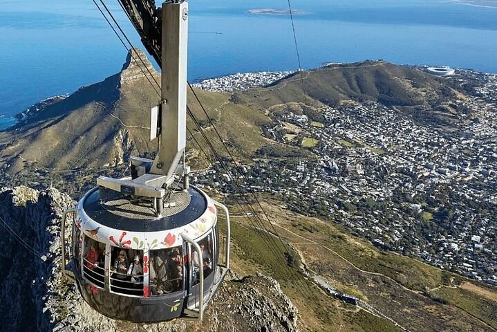 South Africa Safari 8 Table Mountain cable car ascending with Cape Town city and Atlantic Ocean panoramic view South Africa