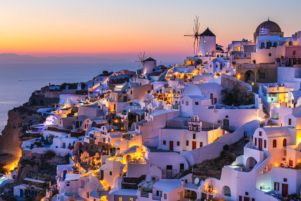 Greece Tours 1 Greece tours featuring iconic Santorini sunset, historic Athens Acropolis, Cycladic windmills