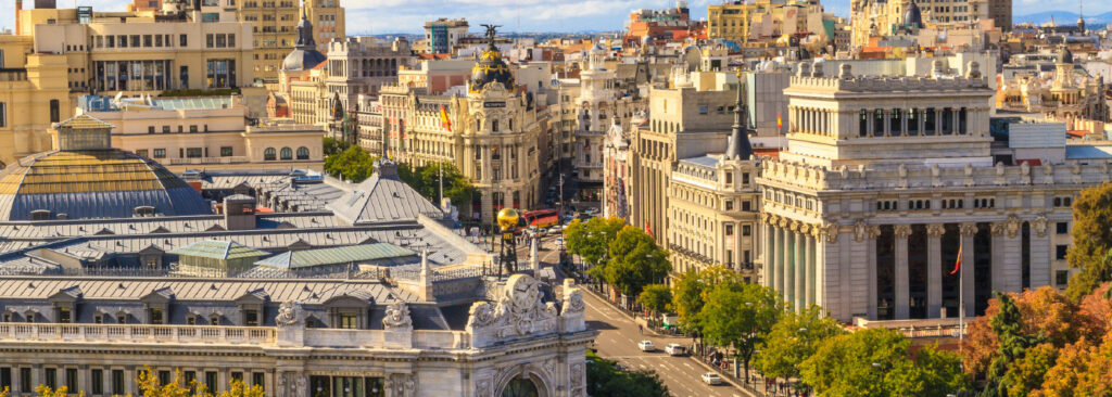 Spain tourism destinations — Barcelona, Madrid, Granada, Seville, Valencia, Málaga, Toledo, Ronda, Basque Country landmarks and beaches.